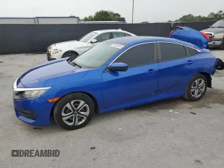 2017 Honda Civic LX z VIN 2HGFC2F52HH569263, wystawiony jako Copart lot #59582355 z przebiegiem 72 811 mil mil oraz Szkoda całkowita • Salvage title. Historia ofert i sprzedaży dostępna na DreamBid. Obrazek 1.