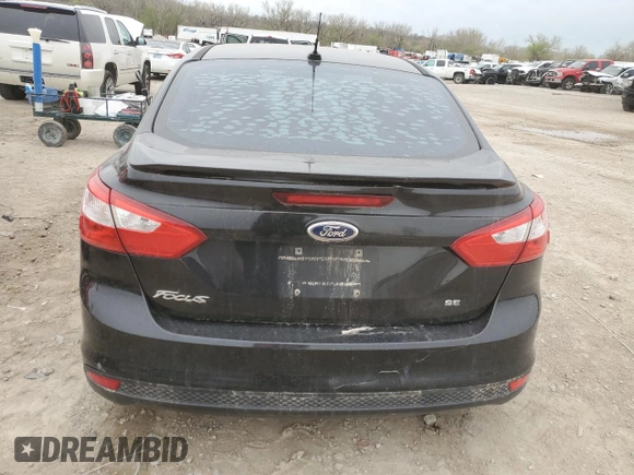 2012 Ford Focus SE with VIN 1FAHP3F27CL400610, listed as a Copart auction lot 51669765 with Not Provided miles and Salvage Title. Bid and sale history available at DreamBid. Image 6.