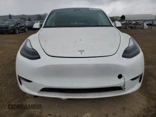 2024 Tesla Model Y Long Range z VIN 7SAYGDEE5RF075756, wystawiony jako Copart lot #48819465 z przebiegiem 10 457 mil mil oraz Szkoda całkowita • Salvage title. Historia ofert i sprzedaży dostępna na DreamBid. Obrazek 5.