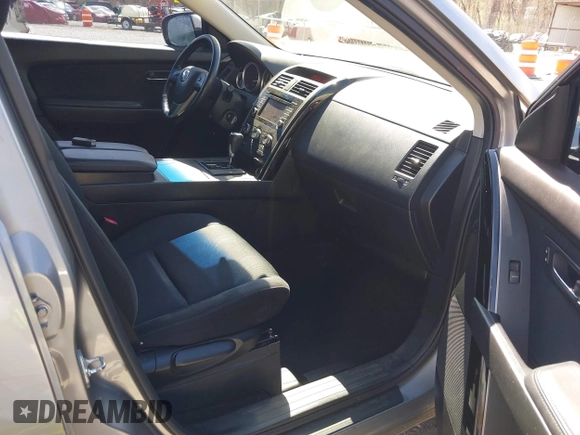2015 Mazda CX-9 Sport with VIN JM3TB2BA7F0450544, listed as a IAAI auction lot 41812565 with 81,727 mi miles and . Bid and sale history available at carsss.com. Image 5.