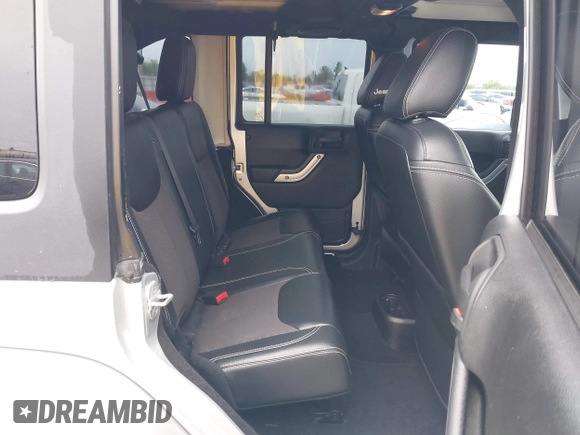 2012 Jeep Wrangler Unlimited Call of Duty MW3 with VIN 1C4BJWFG7CL281844, listed as a IAAI auction lot 42494946 with 93,669 mi miles and . Bid and sale history available at DreamBid. Image 8.