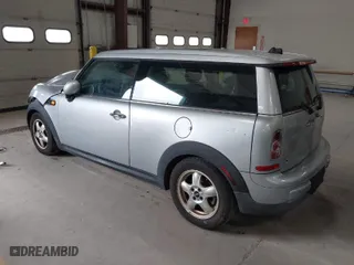 2011 MINI Cooper Clubman with VIN WMWZF3C56BT188312, listed as a IAAI auction lot 41980882 with 143,669 mi miles. Bid and sale history available at carsss.com. Image 3.