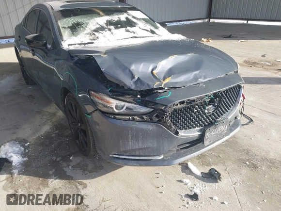 2021 Mazda 6 Carbon Edition with VIN JM1GL1WY6M1616617, listed as a IAAI auction lot 41365615 with 60,747 mi miles and . Bid and sale history available at DreamBid. Image 6.