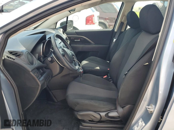 2013 Mazda 5 Sport with VIN JM1CW2BL0D0145429, listed as a Copart auction lot 74133644 with 70,161 mi miles and Salvage Title. Bid and sale history available at DreamBid. Image 7.