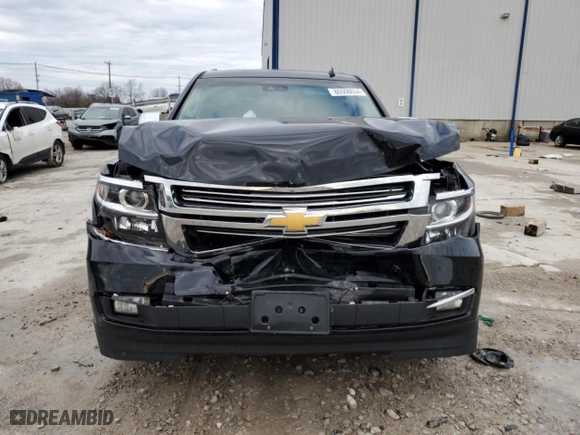 2015 Chevrolet Tahoe LTZ with VIN 1GNSKCKC4FR207496, listed as a Copart auction lot 86508634 with 220,629 mi miles and Salvage Title. Bid and sale history available at carsss.com. Image 5.