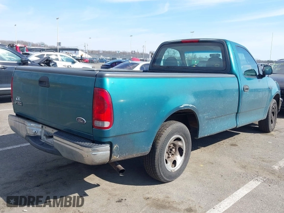 1998 Ford F-150 with VIN 1FTZF1723WNC12776, listed as a IAAI auction lot 41599872 with 125,007 mi miles and . Bid and sale history available at DreamBid. Image 4.