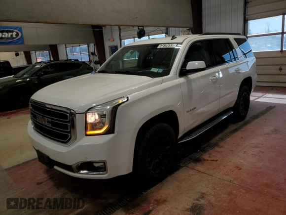 2015 GMC Yukon SLE with VIN 1GKS2AKC6FR254238, listed as a Copart auction lot 51863535 with 110,898 mi miles and Salvage Title. Bid and sale history available at carsss.com. Image 1.