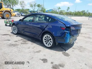 2023 Tesla Model 3 with VIN 5YJ3E1EA0PF658080, listed as a IAAI auction lot 42008846 with 32,301 mi miles and . Bid and sale history available at carsss.com. Image 3.