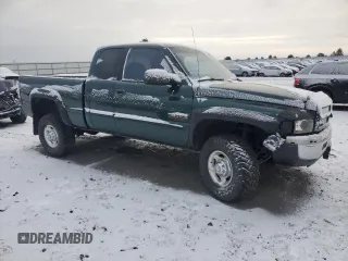 2000 Dodge Ram 2500 with VIN 1B7KF2369YJ151573, listed as a Copart auction lot 83984894 with 213,974 mi miles and Salvage Title. Bid and sale history available at carsss.com. Image 4.