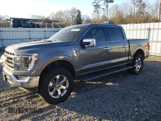 2021 Ford F-150 XL with VIN 1FTFW1E51MFA66207, listed as a Copart auction lot 50061575 with 67,566 mi miles and Salvage title. Bid and sale history available at DreamBid. Image 1.