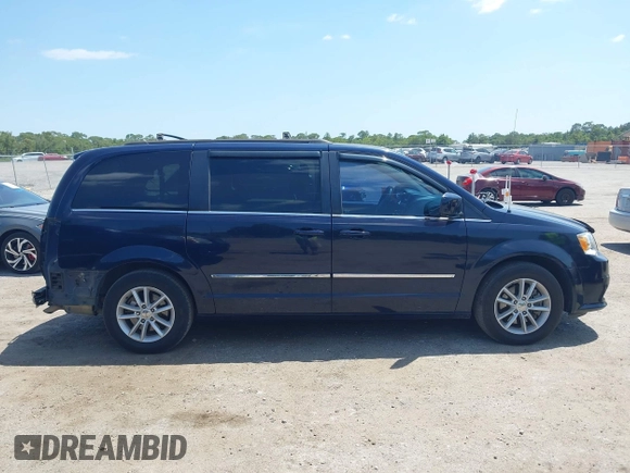 2014 Dodge Grand Caravan SXT with VIN 2C4RDGCG3ER266199, listed as a IAAI auction lot 42119064 with 148,067 mi miles and . Bid and sale history available at DreamBid. Image 14.