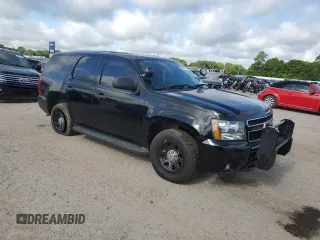 2012 Chevrolet Tahoe Commercial with VIN 1GNLC2E06CR177796, listed as a Copart auction lot 58665705 with 130,810 mi miles and Salvage title. Bid and sale history available at DreamBid. Image 4.