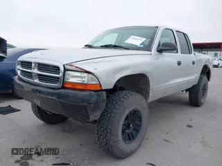 2004 Dodge Dakota Sport with VIN 1D7HG38NX4S608298, listed as a IAAI auction lot 41621473 with 192,876 mi miles. Bid and sale history available at carsss.com. Image 2.