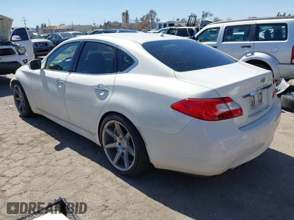 2013 Infiniti M with VIN JN1BY1AP6DM511104, listed as a IAAI auction lot 41818184 with 138,605 mi miles and . Bid and sale history available at DreamBid. Image 3.