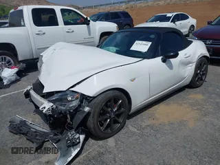 2016 Mazda MX-5 Miata Club z VIN JM1NDAC75G0113400, wystawiony jako IAAI lot #42143080 z przebiegiem 48 579 mil mil oraz . Historia ofert i sprzedaży dostępna na DreamBid. Obrazek 2.