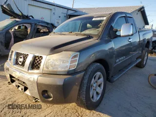 2005 Nissan Titan SE with VIN 1N6BA06B85N574559, listed as a Copart auction lot 83372034 with 105,903 mi miles and Salvage title. Bid and sale history available at DreamBid. Image 1.