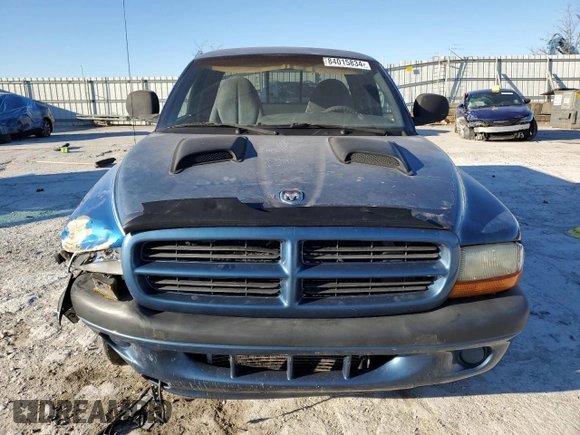 1999 Dodge Dakota SLT with VIN 1B7GL22X5XS321879, listed as a Copart auction lot 84015834 with 210,252 mi miles and Salvage Title. Bid and sale history available at carsss.com. Image 5.