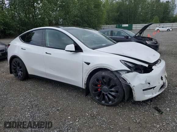 2022 Tesla Model Y Performance with VIN 7SAYGDEFXNF396758, listed as a Copart auction lot 59006365 with 47,882 mi miles and Salvage title. Bid and sale history available at DreamBid. Image 4.