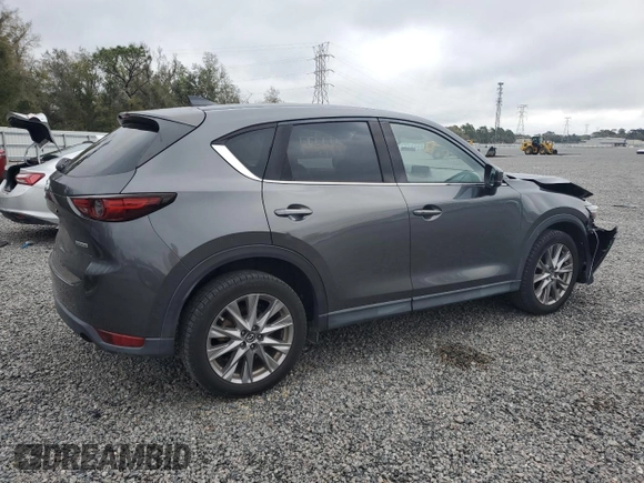 2020 Mazda CX-5 Grand Touring with VIN JM3KFADM6L0839527, listed as a Copart auction lot 46677475 with 50,305 mi miles and Salvage Title. Bid and sale history available at DreamBid. Image 3.