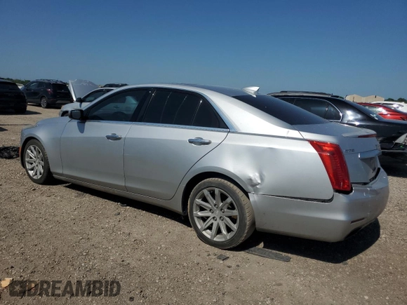 2016 Cadillac CTS RWD with VIN 1G6AP5SX4G0132098, listed as a Copart auction lot 52594175 with 104,683 mi miles and Salvage title. Bid and sale history available at DreamBid. Image 2.