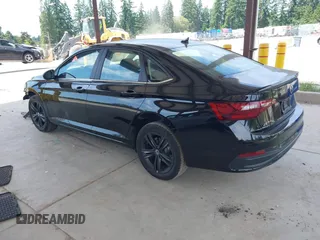 2024 Volkswagen Jetta SE with VIN 3VW7M7BU5RM052470, listed as a IAAI auction lot 42520137 with 26,902 mi miles and . Bid and sale history available at DreamBid. Image 3.