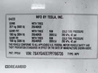 2023 Tesla Model Y Long Range with VIN 7SAYGAEE7PF766735, listed as a IAAI auction lot 41626651 with 21,983 mi miles. Bid and sale history available at carsss.com. Image 9.