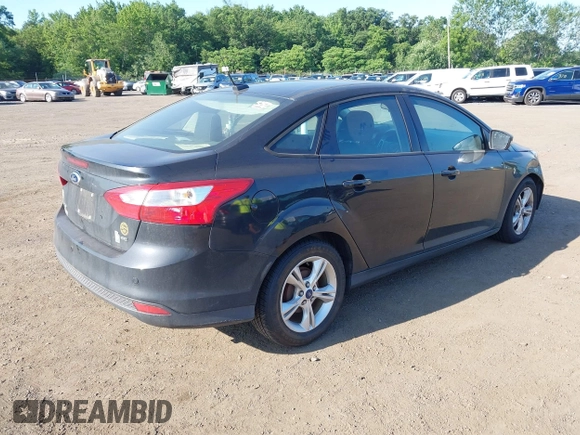 2013 Ford Focus SE with VIN 1FADP3F21DL230177, listed as a IAAI auction lot 42579815 with 243,525 mi miles and . Bid and sale history available at DreamBid. Image 4.