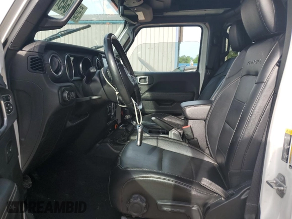 2020 Jeep Wrangler Unlimited Sahara with VIN 1C4HJXEN5LW207076, listed as a Copart auction lot 59461645 with 57,559 mi miles and Salvage title. Bid and sale history available at DreamBid. Image 7.