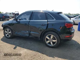 2015 Audi Q3 with VIN WA1EFEFS7FR002823, listed as a Copart auction lot 62159355 with 163,640 mi miles and Salvage title. Bid and sale history available at DreamBid. Image 2.