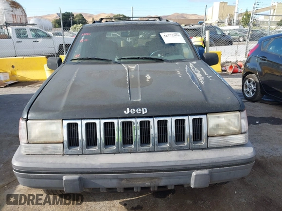 1995 Jeep Grand Cherokee Laredo z VIN 1J4GZ58S9SC553345, wystawiony jako IAAI lot #42772979 z przebiegiem 216 808 mil mil oraz . Historia ofert i sprzedaży dostępna na DreamBid. Obrazek 6.
