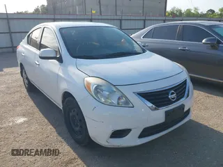 2014 Nissan Versa SV with VIN 3N1CN7AP5EL853686, listed as a IAAI auction lot 42058524 with 156,947 mi miles. Bid and sale history available at carsss.com. Image 1.