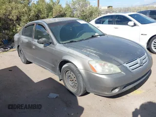 2003 Nissan Altima S z VIN 1N4AL11D73C163112, wystawiony jako IAAI lot #42084672 z przebiegiem 184 140 mil mil oraz . Historia ofert i sprzedaży dostępna na DreamBid. Obrazek 1.