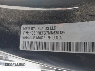 2021 Ram 1500 Big Horn z VIN 1C6RREFG7MN630189, wystawiony jako IAAI lot #41371219 z przebiegiem 62 613 mil mil oraz . Historia ofert i sprzedaży dostępna na DreamBid. Obrazek 9.