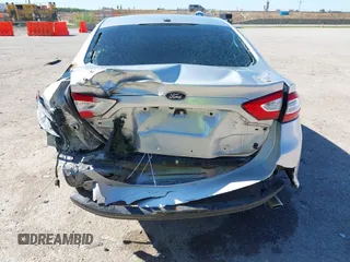 2016 Ford Fusion S z VIN 3FA6P0G75GR105206, wystawiony jako IAAI lot #42032773 z przebiegiem 174 927 mil mil oraz . Historia ofert i sprzedaży dostępna na DreamBid. Obrazek 6.