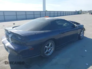 2001 Chevrolet Camaro Z28 z VIN 2G1FP22G312146719, wystawiony jako IAAI lot #42228792 z przebiegiem 134 142 mil mil oraz . Historia ofert i sprzedaży dostępna na DreamBid. Obrazek 4.