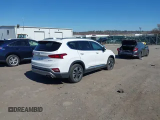 2019 Hyundai Santa Fe Ultimate with VIN 5NMS5CAA0KH067753, listed as a IAAI auction lot 41884396 with 31,343 mi miles and . Bid and sale history available at DreamBid. Image 4.