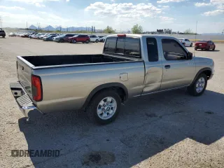 2000 Nissan Frontier XE with VIN 1N6DD26S7YC430643, listed as a Copart auction lot 59386765 with 204,851 mi miles and Salvage title. Bid and sale history available at DreamBid. Image 3.