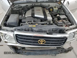 2000 Toyota Land Cruiser z VIN JT3HT05J4Y0088451, wystawiony jako Copart lot #52208905 z przebiegiem 329 751 mil mil oraz Nie do naprawy • Non repairable. Historia ofert i sprzedaży dostępna na DreamBid. Obrazek 12.