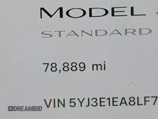 2020 Tesla Model 3 Standard Range Plus with VIN 5YJ3E1EA8LF783631, listed as a IAAI auction lot 40696383 with 78,889 mi miles. Bid and sale history available at carsss.com. Image 14.