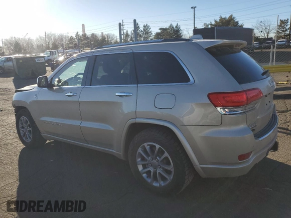 2015 Jeep Grand Cherokee High Altitude with VIN 1C4RJFCM6FC878769, listed as a Copart auction lot 46704755 with 81,727 mi miles and Salvage title. Bid and sale history available at DreamBid. Image 2.