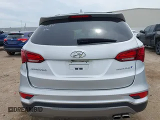 2018 Hyundai Santa Fe 2.0T z VIN 5XYZU4LA9JG537310, wystawiony jako IAAI lot #42393689 z przebiegiem Nie podano mil oraz . Historia ofert i sprzedaży dostępna na DreamBid. Obrazek 16.