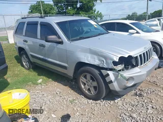 2006 Jeep Grand Cherokee Laredo with VIN 1J4GS48K56C260532, listed as a IAAI auction lot 42607110 with 153,110 mi miles and . Bid and sale history available at DreamBid. Image 1.