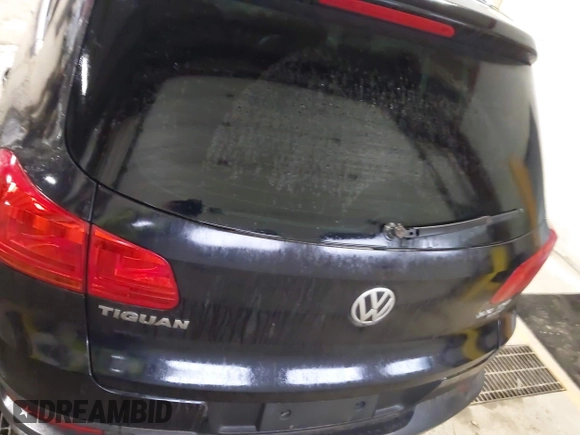 2013 Volkswagen Tiguan SE z VIN WVGBV7AX3DW508802, wystawiony jako IAAI lot #41471406 z przebiegiem 102 426 mil mil oraz . Historia ofert i sprzedaży dostępna na DreamBid. Obrazek 16.