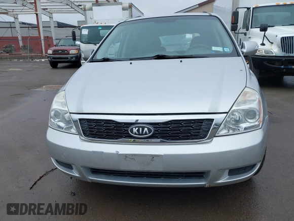 2012 Kia Sedona LX with VIN KNDMG4C72C6485952, listed as a IAAI auction lot 42029147 with 129,296 mi miles. Bid and sale history available at carsss.com. Image 12.