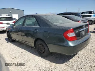 2002 Toyota Camry LE z VIN JTDBE32K120068644, wystawiony jako Copart lot #61168915 z przebiegiem 210 149 mil mil oraz Czysty tytuł • Clean title. Historia ofert i sprzedaży dostępna na DreamBid. Obrazek 2.