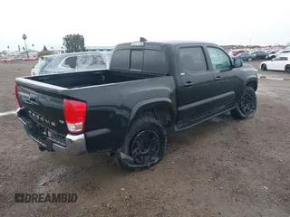2017 Toyota Tacoma SR5 with VIN 5TFAZ5CN2HX040954, listed as a IAAI auction lot 41733137 with 97,780 mi miles and . Bid and sale history available at DreamBid. Image 4.