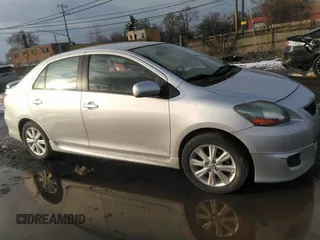 2010 Toyota Yaris with VIN JTDBT4K3XA1360452, listed as a IAAI auction lot 41557092 with 107,989 mi miles. Bid and sale history available at carsss.com. Image 1.