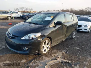 2010 Mazda Mazda5 Sport with VIN JM1CR2W3XA0385634, listed as a IAAI auction lot 41381553 with 128,726 mi miles. Bid and sale history available at carsss.com. Image 2.