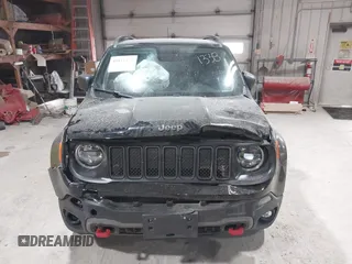2019 Jeep Renegade Trailhawk z VIN ZACNJBC11KPJ92963, wystawiony jako IAAI lot #41811338 z przebiegiem 95 852 mil mil oraz . Historia ofert i sprzedaży dostępna na DreamBid. Obrazek 12.