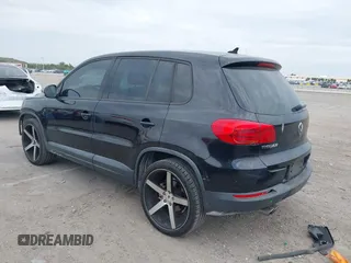 2014 Volkswagen Tiguan SE z VIN WVGAV3AXXEW535128, wystawiony jako IAAI lot #41882213 z przebiegiem 103 161 mil mil oraz . Historia ofert i sprzedaży dostępna na DreamBid. Obrazek 3.